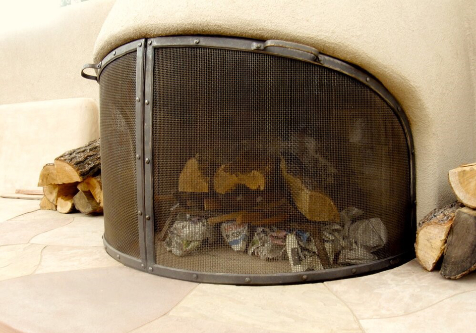 Fireplace screen by Christin Boyd of Flygirl Iron.